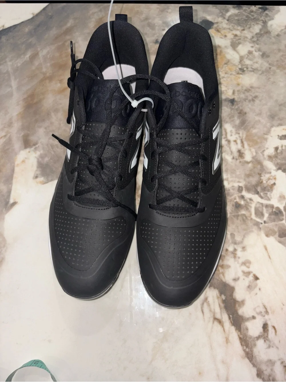 New Balance Men’s Black and White Baseball Cleats with Metal Spikes